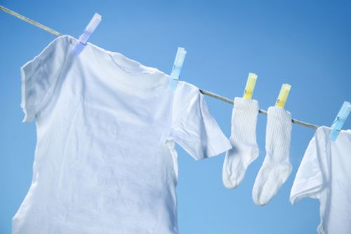 Clothes drying on clothesline on a summer day